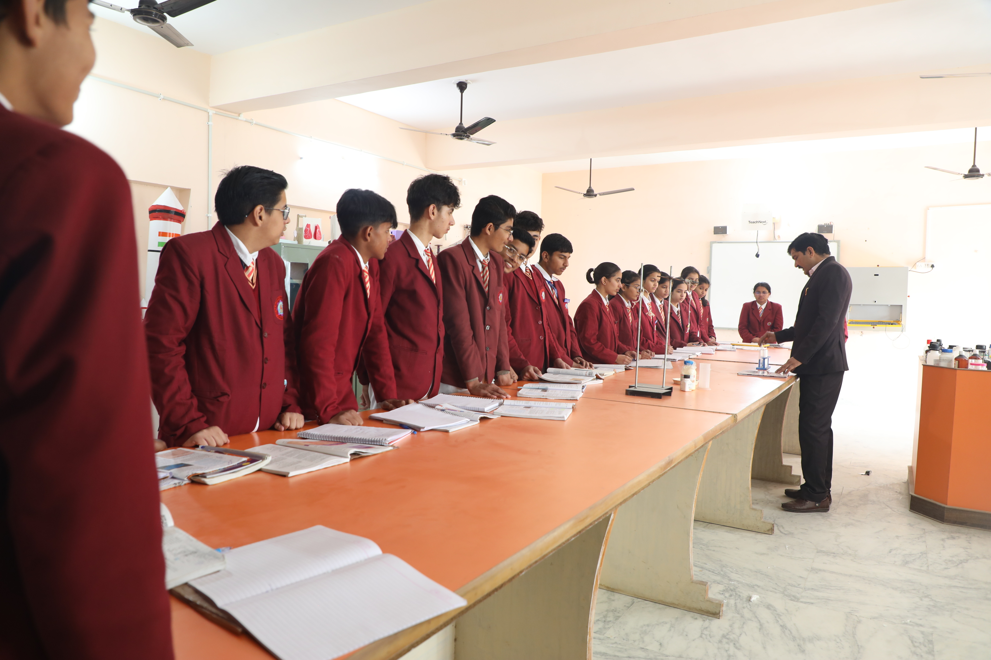 Spacious, well-lit classroom with students